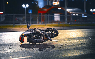 motorcycle on its side on the road accidents
